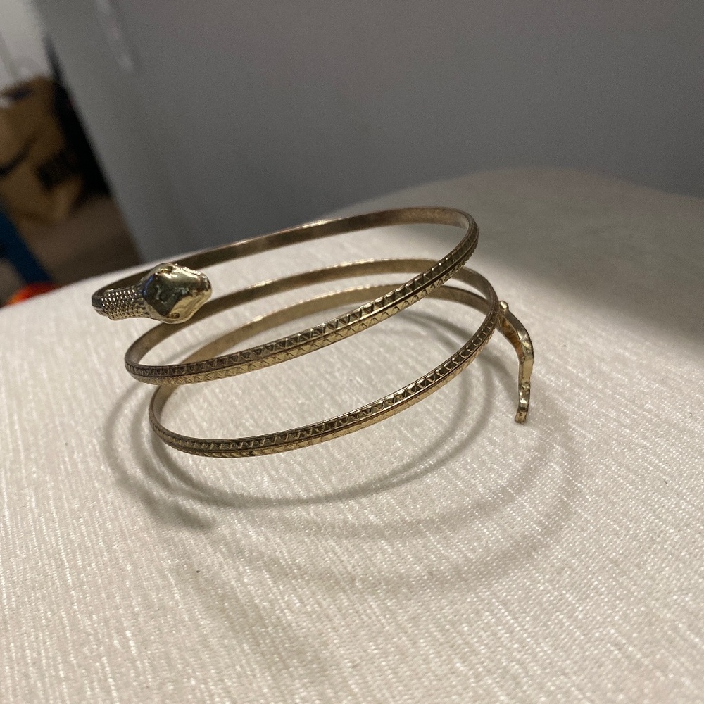 Goldtone snake arm cuff cleopatra